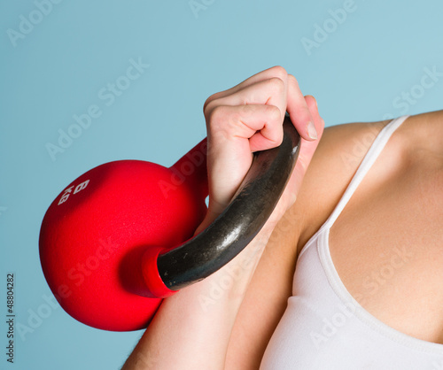 Photo: Girl and kettlebell Girl and kettlebell