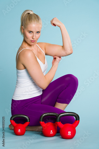 Photo: Girl and kettlebell Girl and kettlebell