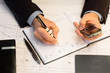 businessman writing business engagement