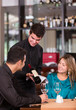 Couple trying wine at a restaurant