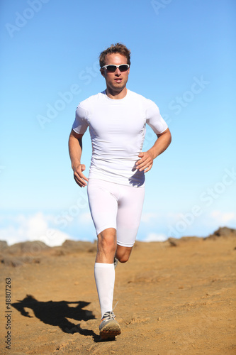 Photo: Athlete sports fitness runner running Athlete sports fitness runner running