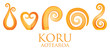 A set of orange glass Maori Koru curl ornaments.