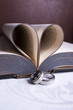 Two Hebrew wedding rings with a heart shaped Afrikaans Bible