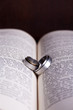 Photo: Two Hebrew wedding rings on an open Afrikaans Bible Two Hebrew wedding rings on an open Afrikaans Bible