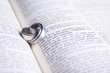 Photo: Two Hebrew wedding rings on an open Afrikaans Bible Two Hebrew wedding rings on an open Afrikaans Bible