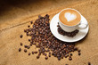 Latte art and coffee beans