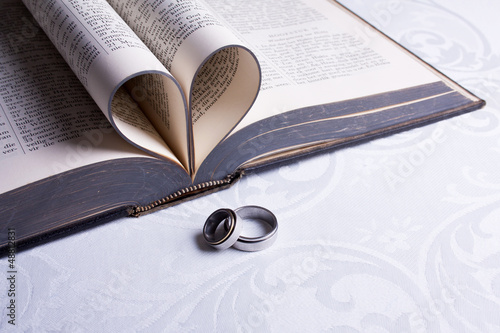 Photo: Two Hebrew wedding rings with a heart shaped Afrikaans Bible Two Hebrew wedding rings with a heart shaped Afrikaans Bible