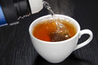 Pouring water for your tea cup