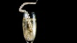 Pearl necklace falling into champagne