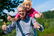 happy mature or senior couple having walk
