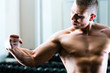 Bodybuilder posing in Gym