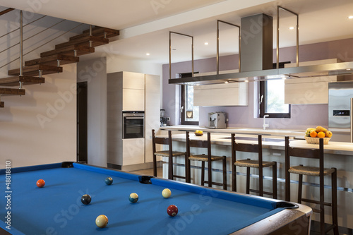 Photo: interior of beautiful modern apartment, billiards interior of beautiful modern apartment, billiards