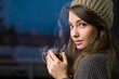 Gorgeous young brunette holding tea.