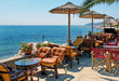 Beautiful cafeteria at the beach, on Santorini island, Greece