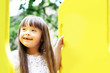 Portrait of beautiful young girl on the playground