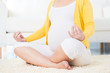 Pregnant woman meditating