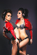 Bdsm. Sultry Women Girlfriends Hugging. Dance. Nightlife
