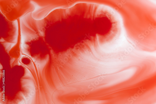 Photo: Abstract watercolor red background in water on white Abstract watercolor red background in water on white