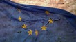 EU flag with the texture and background of old, cracked wall