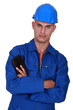 craftsman holding his wallet
