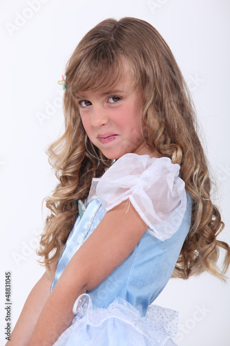 Photo: little girl in a fancy dress little girl in a fancy dress