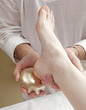 foot massage with kansu bowl with ayurvedic technique