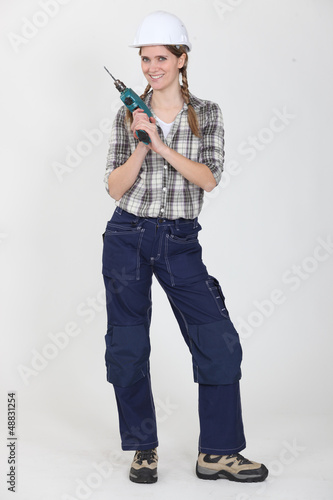Photo: Woman with a drill Woman with a drill