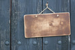 Grunge wood frame blank with rope hanging on nail background