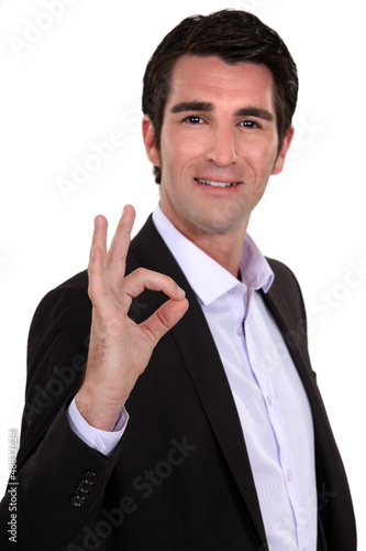 Photo: portrait of smart man making okay sign portrait of smart man making okay sign