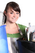 Girl sorting her garbage
