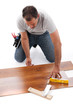 Carpenter working with wood planks