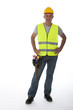 Construction worker wearing hard hat and vest