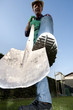 Gardener working in garden