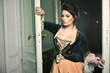 Beautiful, elegant lady in manor house