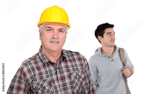 Photo: Senior laborer and young man Senior laborer and young man