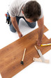 Carpenter working with wood planks