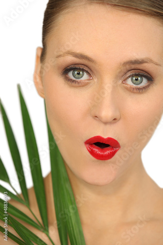Photo: Young woman with foliage Young woman with foliage