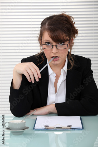 Photo: Woman with clipboard interviewing Woman with clipboard interviewing