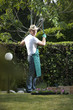Gardener working in garden