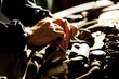 Automobile mechanic working in garage