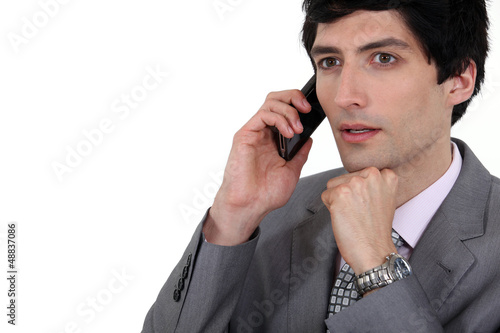 Photo: Man having perturbating news. Man having perturbating news.