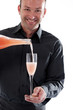 Bartender pouring cocktail in glass