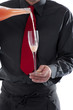 Bartender pouring cocktail in glass