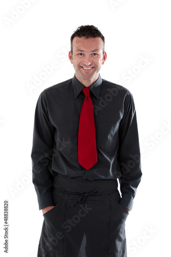 Photo: Server wearing black shirt and apron Server wearing black shirt and apron