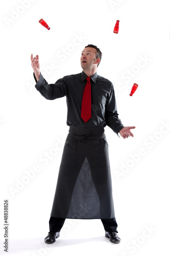Photo: Bartender juggling bottles Bartender juggling bottles