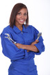 Woman holding two spanners