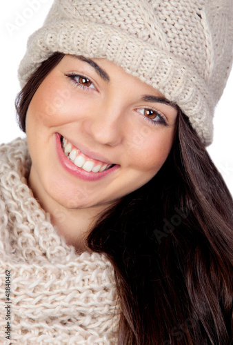 Photo: Attractive girl with with wool hat and scarf Attractive girl with with wool hat and scarf