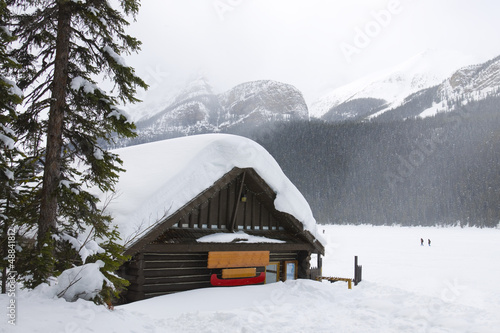 Photo: Cabin in the woods in the middle of winter Cabin in the woods in the middle of winter