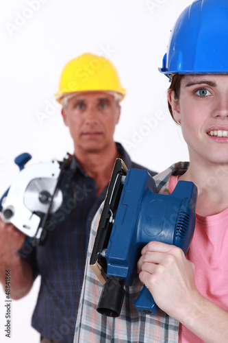 Photo: man and woman carpenters man and woman carpenters