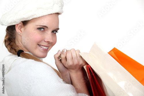 Photo: woman holding shopping bags woman holding shopping bags